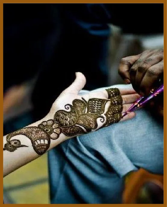 Top Heavy Peacock Pattern Modern Front Hand Mehndi Design
